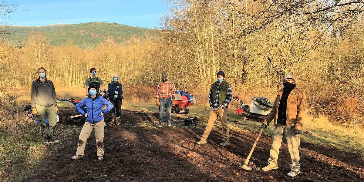 Volunteers with Skagit Trail Builders, wearing masks and socially distanced